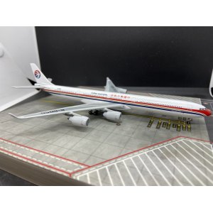 China Eastern 中国东方航空 Airbus A340-600 B-6050 1990s colors. GJCES411 Geminijets 1:400